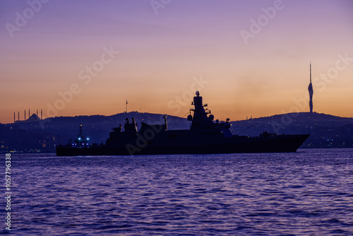 Silhouette of a military vessel entering the port of Istanbul, emphasizing the global defense of maritime trade routes to ensure their protection.