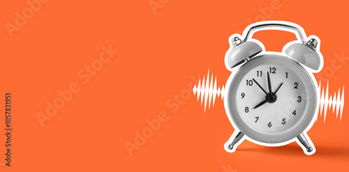 Alarm clock on color backgr...