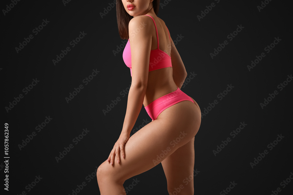 sexy young woman in lingerie on dark background sexy young woman in lingerie on dark background