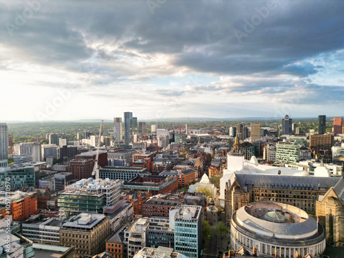 High Angle View of iconic Buildings at Central Greater Manchester City Centre and Tall Buildings During Golden Hour of Sunset over England UK. May 5th, 2024.