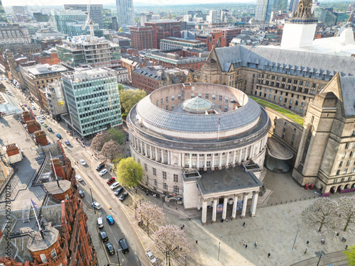 High Angle View of iconic Buildings at Central Greater Manchester City Centre and Tall Buildings During Golden Hour of Sunset over England UK. May 5th, 2024. photo