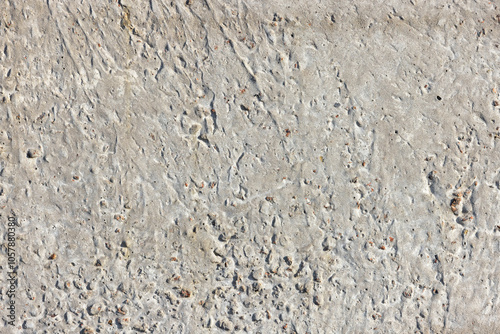 Obraz na płótnie Concrete texture with small holes and irregular surface, perfect for backgrounds and design projects, construction material concept w salonie