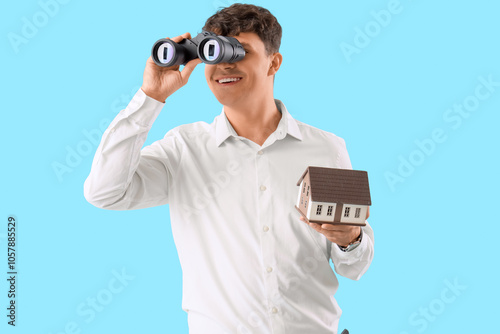 Male real estate agent with...