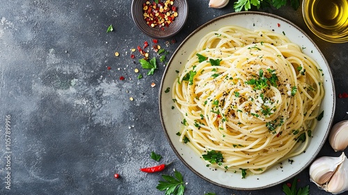 Spaghetti Aglio e Olio. The most popular Italian dishes. Simple spaghetti with a glossy, pale oil and flecks of parsley and garlic.
