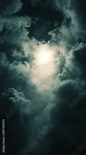 Mysterious clouds illuminated by bright moonlight creating an ethereal nightt...