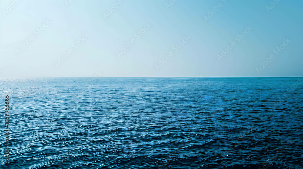 Obraz premium Deep blue ocean with a clear horizon. The water is calm and serene.