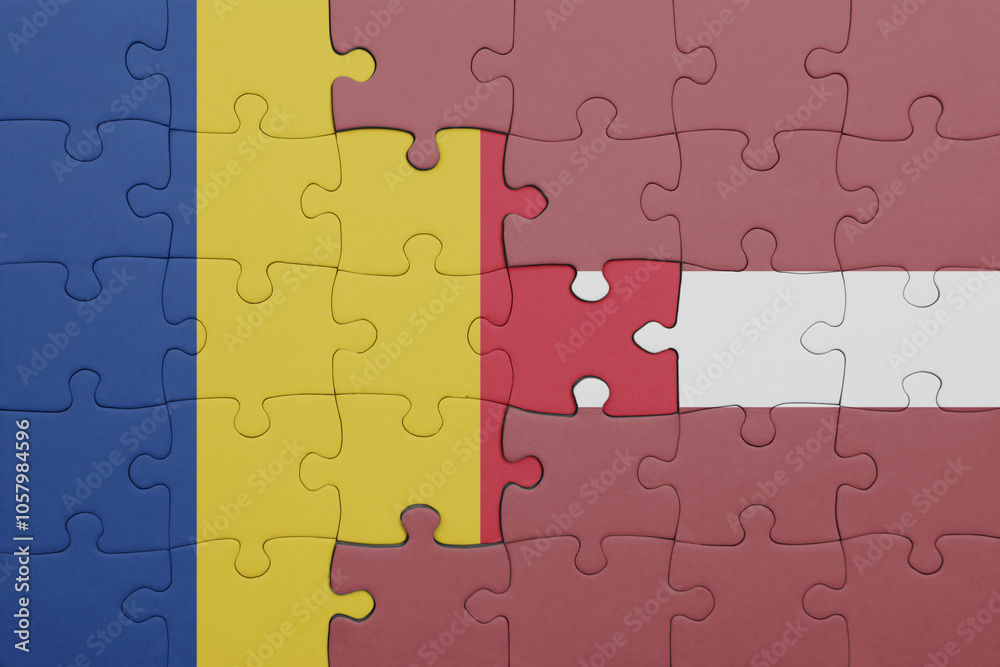 puzzle with the colourful national flag of romania and flag of latvia . puzzle with the colourful national flag of romania and flag of latvia .
