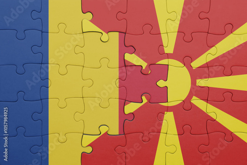 puzzle with the colourful national flag of romania and flag of macedonia .