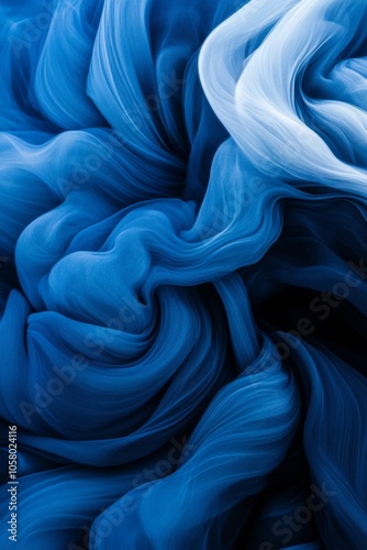 Abstract blue and white swirl pattern.