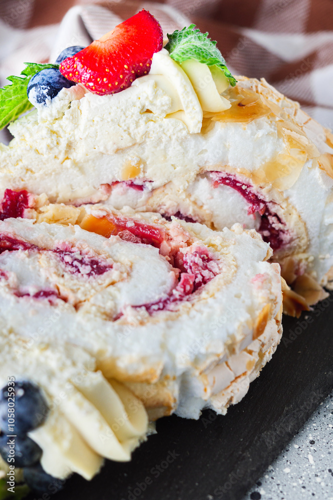 Delicate Meringue Roulade with Blueberries, Strawberries, and Mascarpone Cream Delicate Meringue Roulade with Blueberries, Strawberries, and Mascarpone Cream