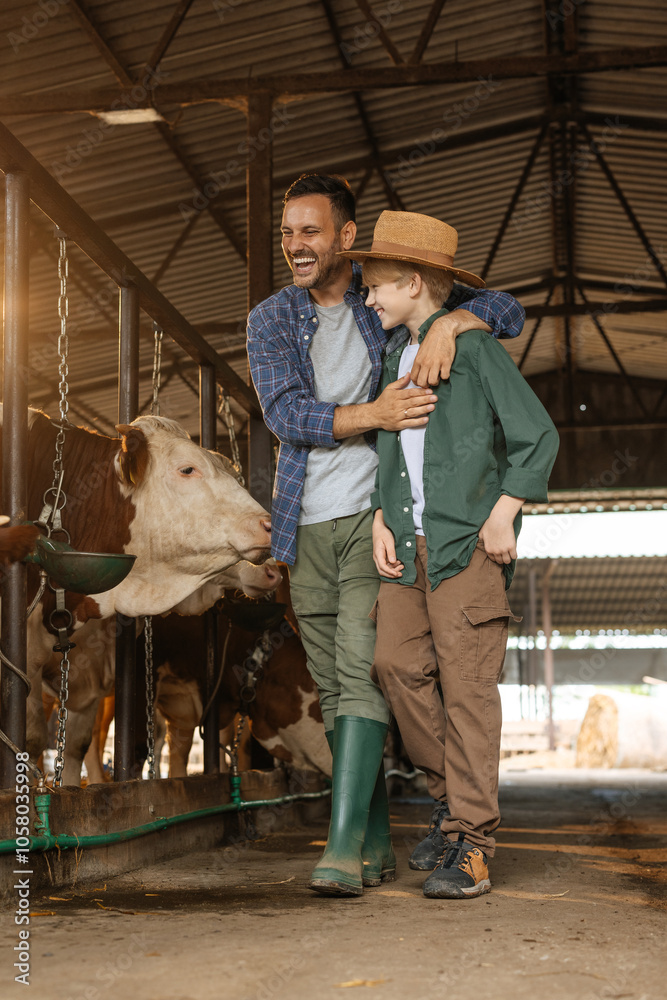 Father and son bonding moment in a barn Father and son bonding moment in a barn