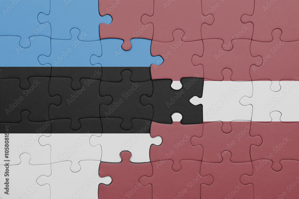 puzzle with the colourful national flag of estonia and flag of latvia . puzzle with the colourful national flag of estonia and flag of latvia .