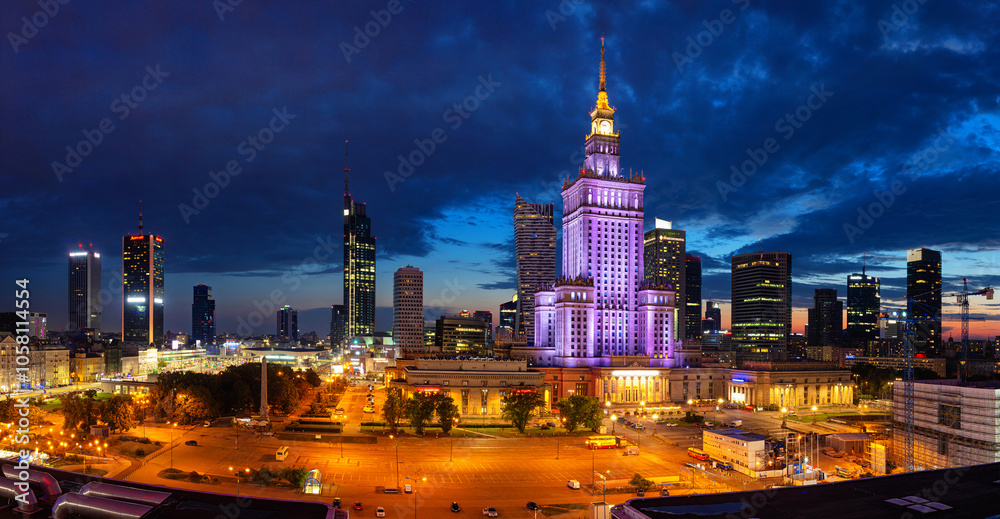 Evening cityscape with city lights - view of the Warsaw downtown and The Palace of Culture and Science. Warsaw. Poland