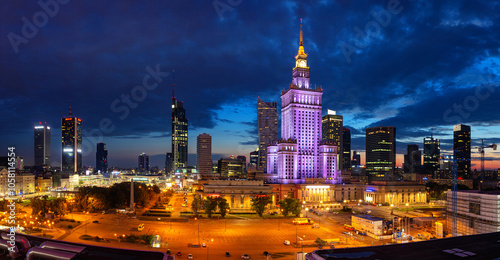 Obraz na płótnie Evening cityscape with city lights - view of the Warsaw downtown and The Palace of Culture and Science. Warsaw. Poland w salonie