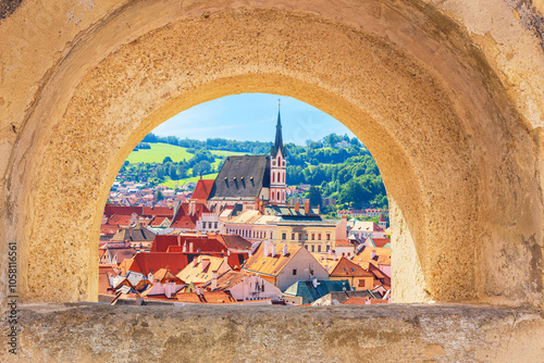 Summer cityscape - top view from the Cesky Krumlov Castle to the historic centre Cesky Krumlov with St. Vitus Church, Czech Republic