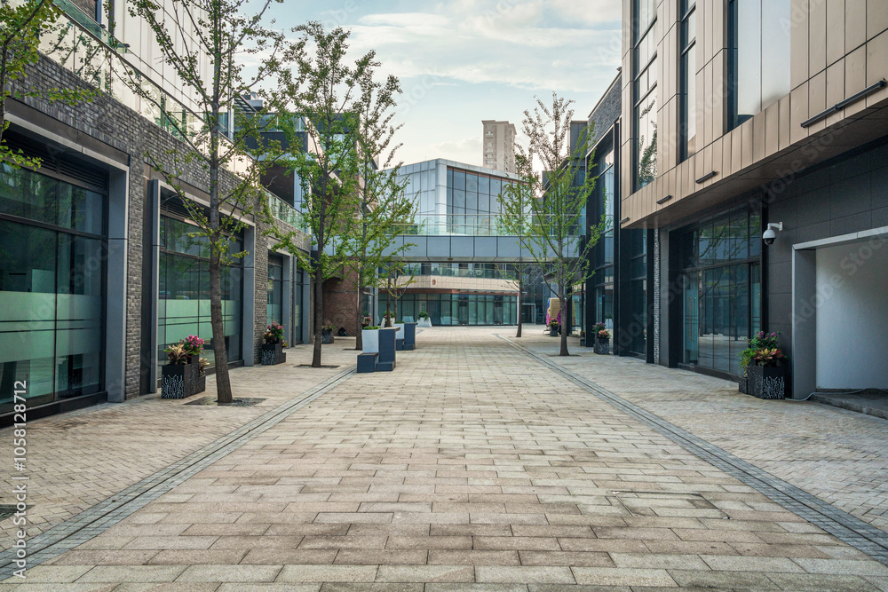 Tranquil Urban Passage with Modern Architecture and Greenery