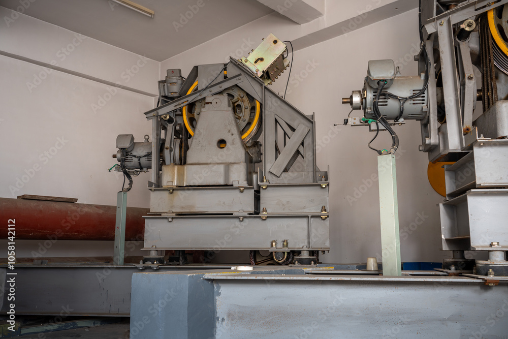 Heavy Industrial Machinery in Factory Setting Heavy Industrial Machinery in Factory Setting
