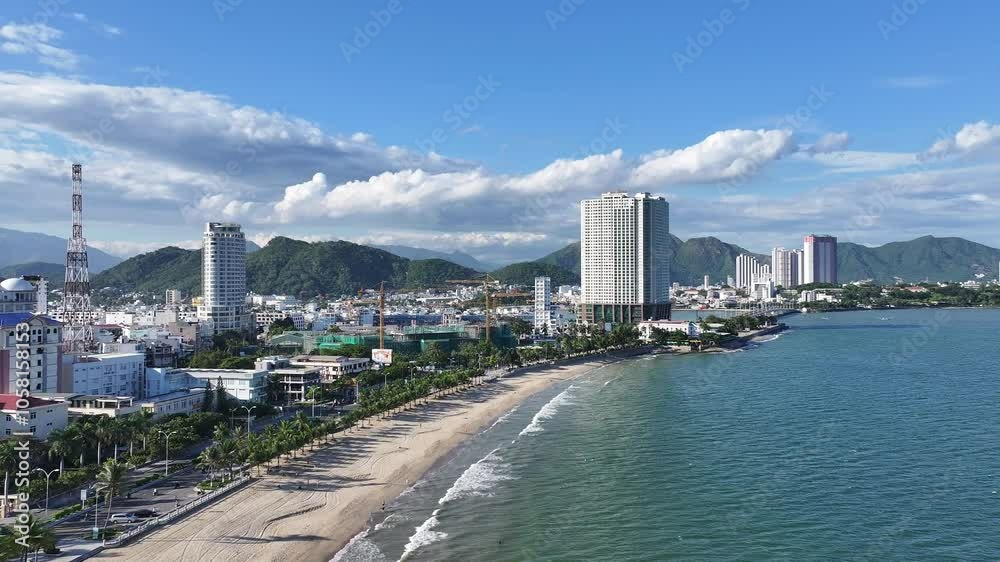 The coastal city of Nha Trang seen from above in the affternoon, beautiful coastline. This is a city that attracts to relax in central Vietnam The coastal city of Nha Trang seen from above in the affternoon, beautiful coastline. This is a city that attracts to relax in central Vietnam