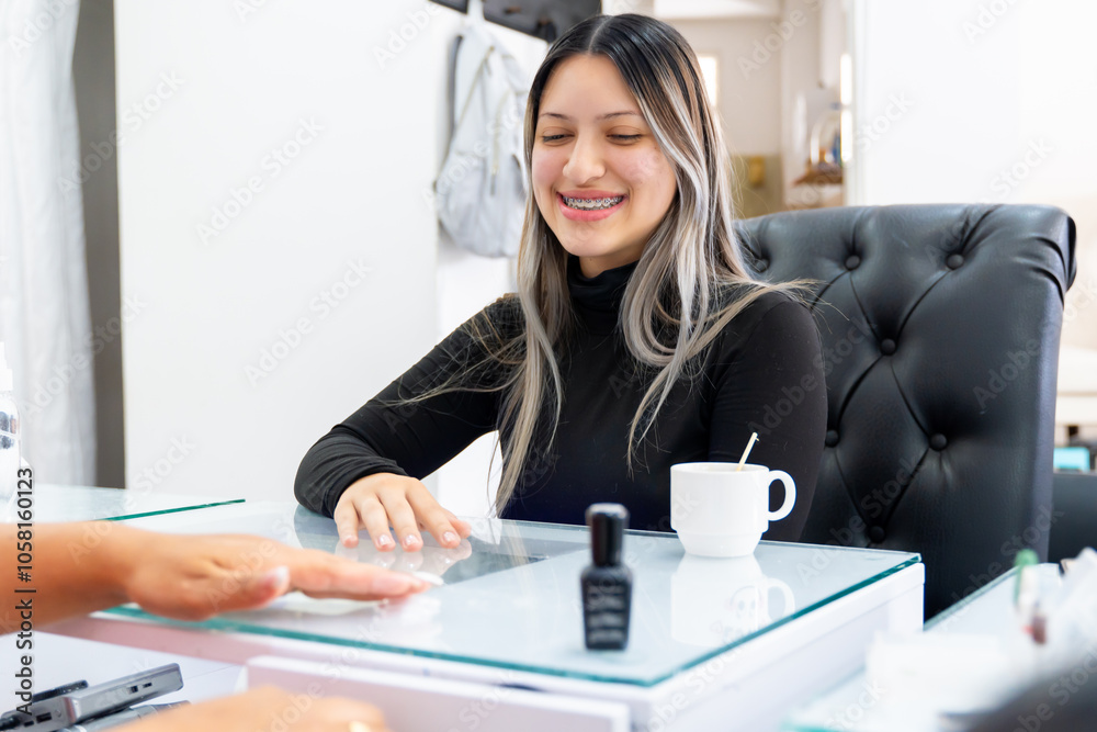 Colombian latina woman in nail spa. Beauty and fashion, time for relaxation and femininity. Colombian latina woman in nail spa. Beauty and fashion, time for relaxation and femininity.