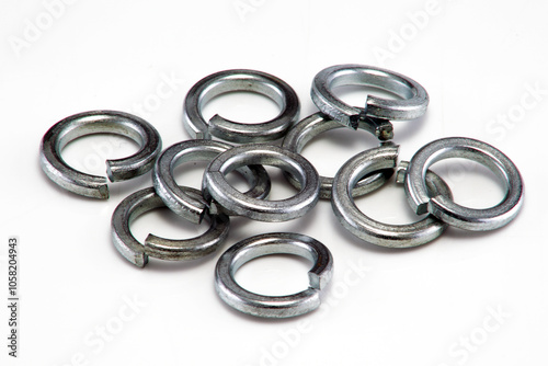 Large split spring washers on white background photo