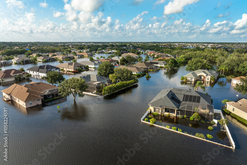 Tropical rainstorm flooded residential homes in suburban community in Florida. Hurricane aftermath photo