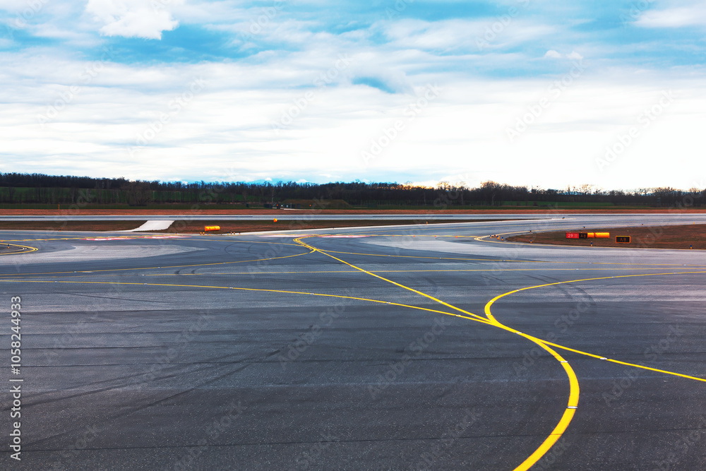 Empty runway strip with markings. Asphalt airport runway