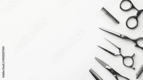 A collection of hairdressing tools arranged on a white background for stylistic purposes.