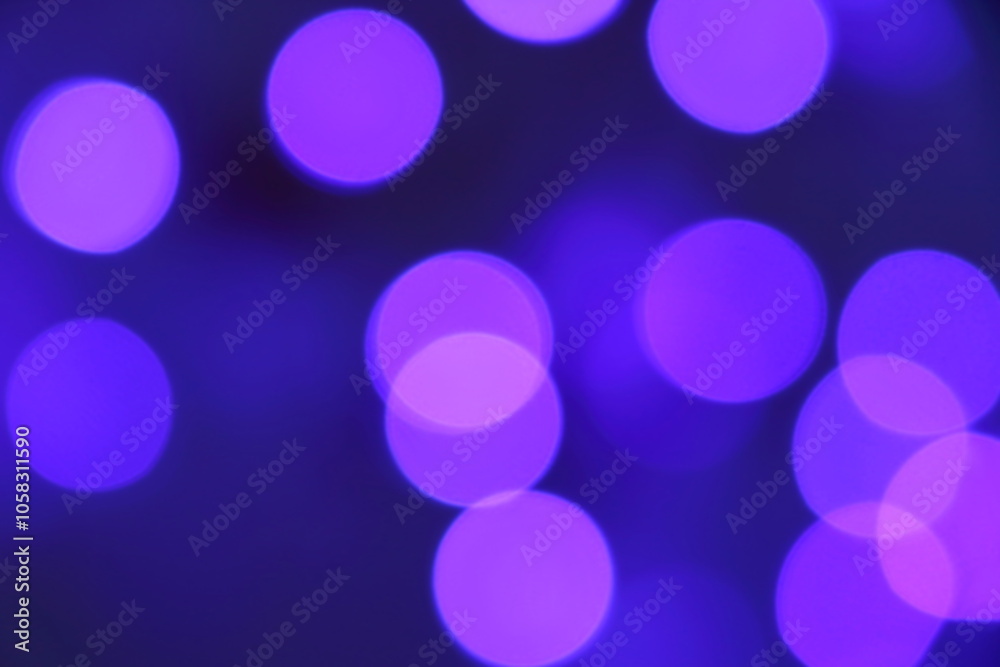 Many soft blue and purple blurry bokeh light on dark tone background in Christmas and New Year festival day, can use for background Many soft blue and purple blurry bokeh light on dark tone background in Christmas and New Year festival day, can use for background