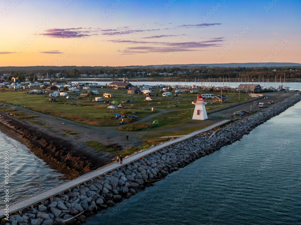 Obraz premium Phare de la pointe Bonaventure lighthouse and campground at sunset, Bonaventure, Quebec, Canada.