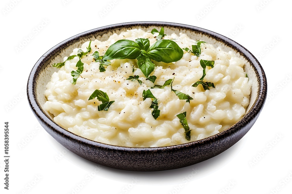 Delicious risotto with basil and pepper, served in a bowl, isolated on white, perfect for food and culinary projects Delicious risotto with basil and pepper, served in a bowl, isolated on white, perfect for food and culinary projects
