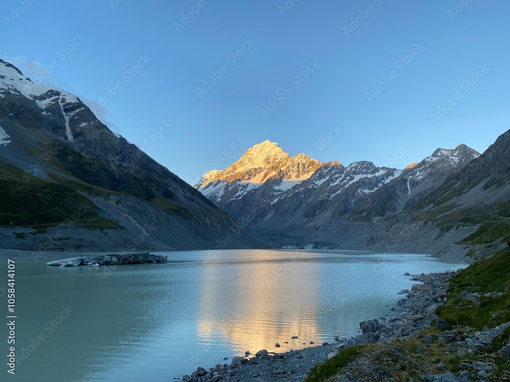 Beautiful views of Majestic Mount Cook over Hooker Lake. Lake in the mountains Beautiful views of Majestic Mount Cook over Hooker Lake. Lake in the mountains