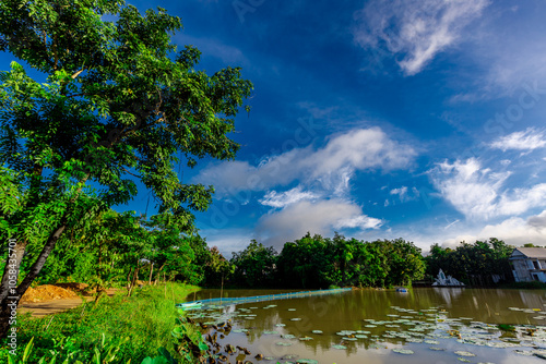 The background of an important tourist attraction in Khon Kaen Province (Wat Thung Setthi) is a large pagoda in the middle of a swamp, tourists always come to see the beauty in Thailand photo