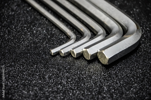 Allen Wrench on Black Background. L key isolated on black, tools, repair shop