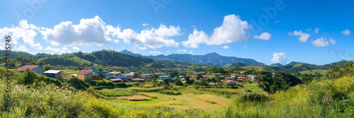 Sunny Day in Charming Mountain Village: Colorful Houses and Blooming Gardens Panoramic View