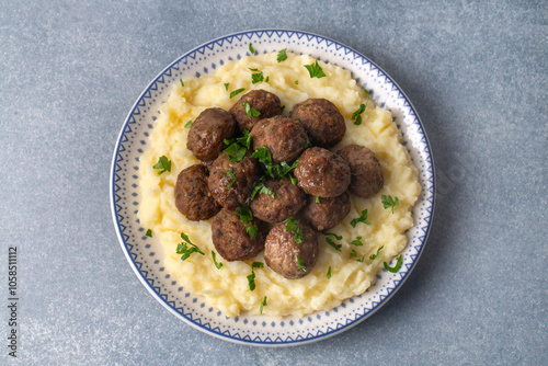 Fried meatball balls on mas...