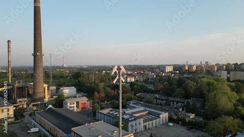 Hammer emblem on the old mine shaft in Siemianowice city during summer day, heavy industry, extraction area - drone 4K photo