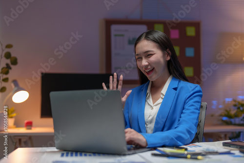 Asian businesswoman working on laptop online communicating Financial contact information with customers, planning, business success in the office modern online business ideas.