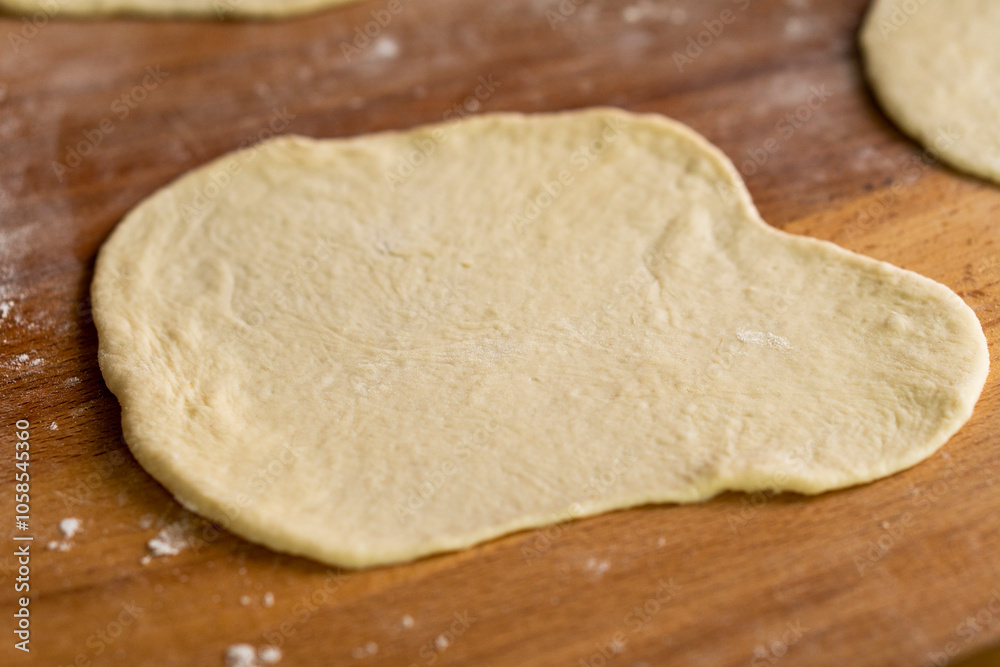 Wheaten Pita Flat Bread. Baking Bread. Raw pita. Food concept Wheaten Pita Flat Bread. Baking Bread. Raw pita. Food concept
