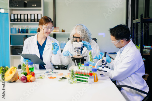 Food scientists in lab coats, testing samples, and analyzing food safety and quality in a modern laboratory