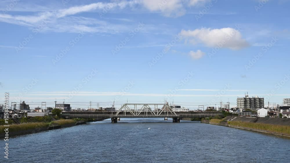 Animation of Tokyo river surface, riverbed, and birds flying above. Animation of Tokyo river surface, riverbed, and birds flying above.