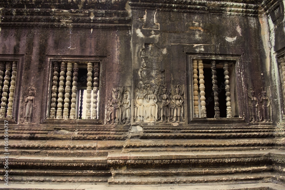 Lattice window in Angkor Wat, a Hindu-Buddhist temple complex in Cambodia Lattice window in Angkor Wat, a Hindu-Buddhist temple complex in Cambodia