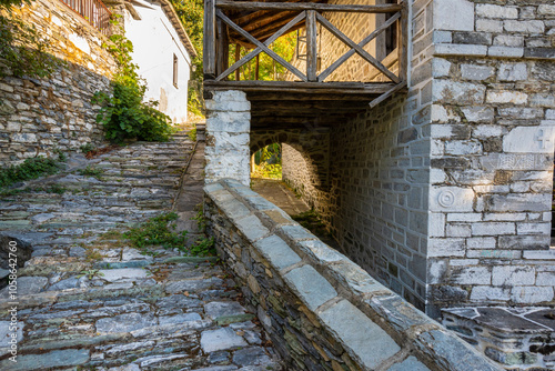 Stone lined pathways in traditional greek village Makrinitsa in Pelion Greece. Traditional architecture.