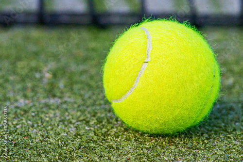 tennis ball on the court tennis background Close-up shots of tennis balls in tennis courts With a mesh as a blurred background