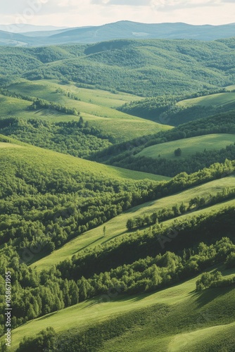 This image depicts a picturesque mountain landscape with lush greenery and rolling hills.