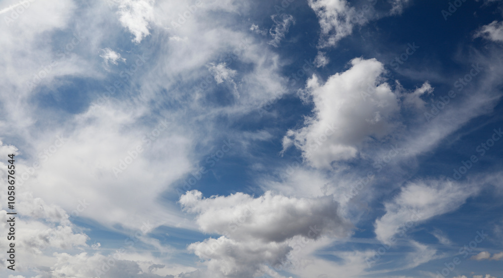Blue sky background with tiny clouds. Nature abstract background Blue sky background with tiny clouds. Nature abstract background