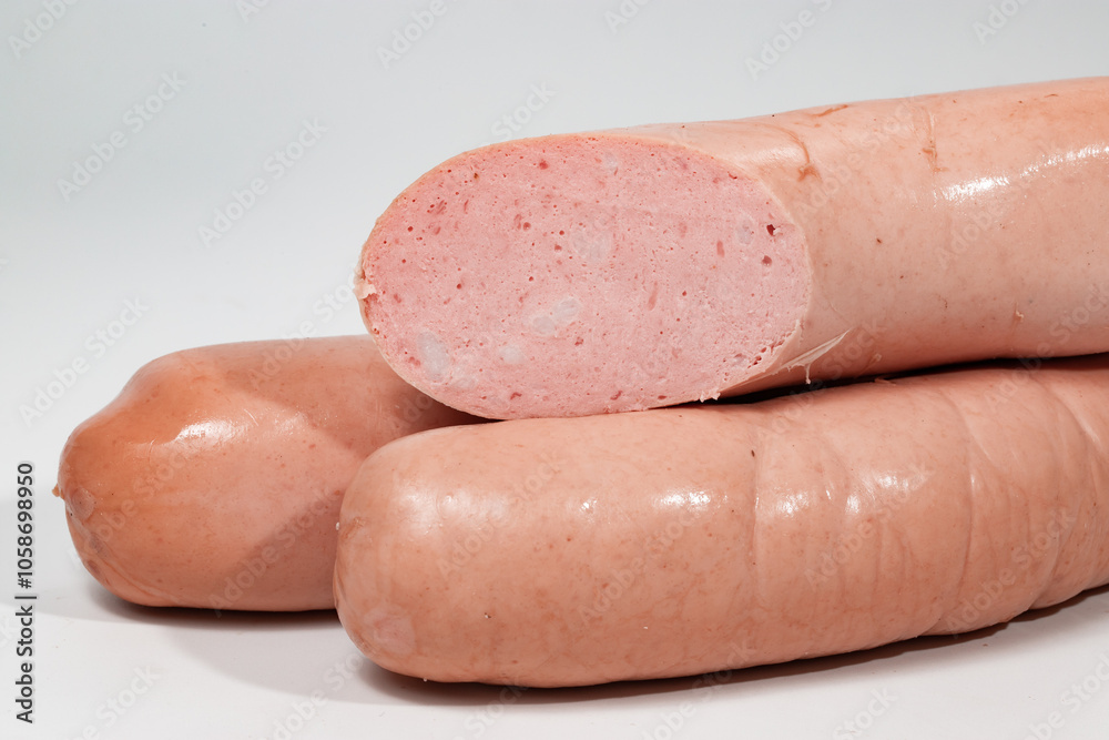 Sausages, semi-finished meat products, salads on a white background