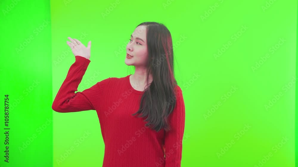 Happy woman, hand and green screen for product placement, A woman is presenting on a green screen. Happy woman, hand and green screen for product placement, A woman is presenting on a green screen.