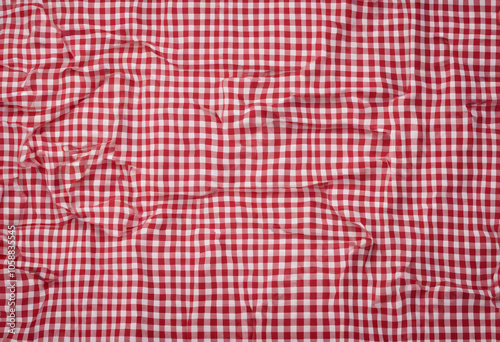 Red and white checkered tablecloth Top view table cloth texture background Red gingham pattern fabri photo