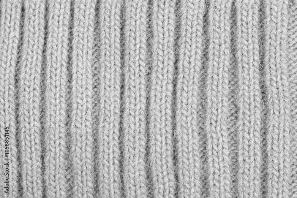 White natural texture of knitted wool textile material background. White cotton fabric woven canvas texture White natural texture of knitted wool textile material background. White cotton fabric woven canvas texture
