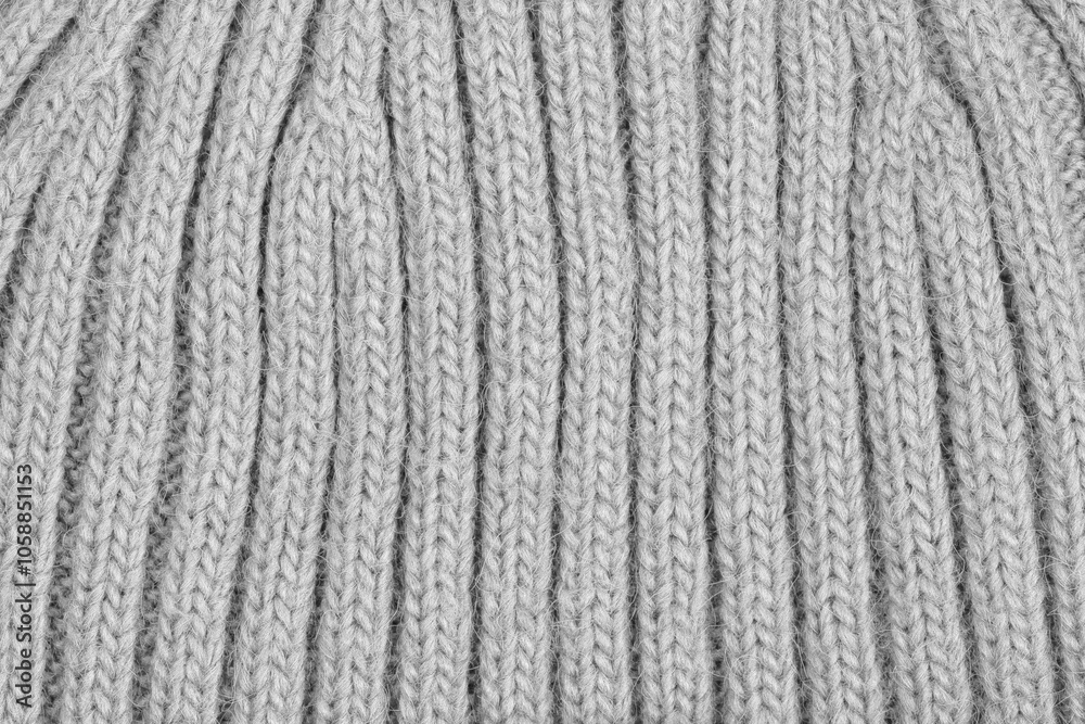 White natural texture of knitted wool textile material background. White cotton fabric woven canvas texture White natural texture of knitted wool textile material background. White cotton fabric woven canvas texture